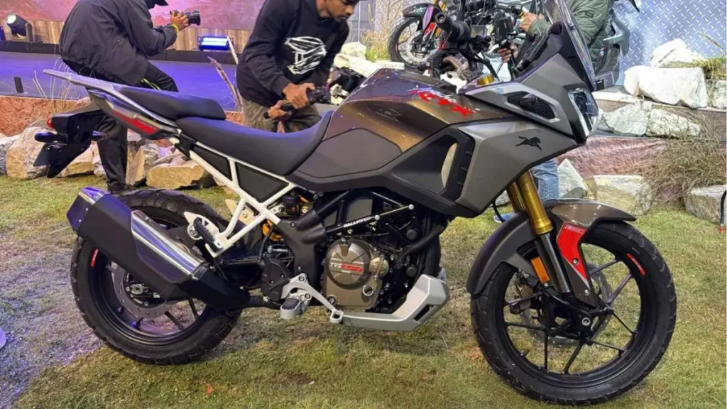 TVS RTX 300 side profile showcasing rugged design, windscreen, and dual-purpose tyres