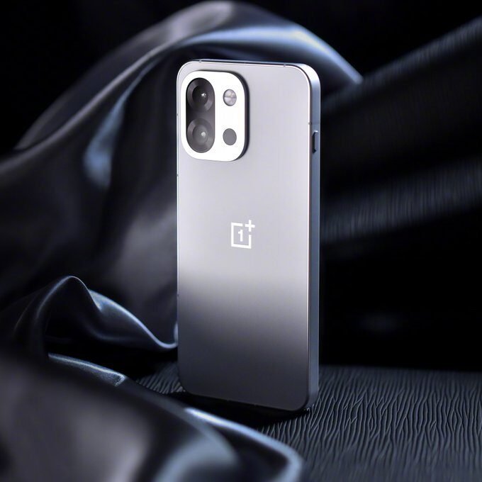 OnePlus 15s Comeback: Compact Flagship Phone Returns With Reworked Cameras 1 OnePlus 15s compact flagship smartphone in silver finish featuring a dual-camera module, shown from the rear against a dark premium background.